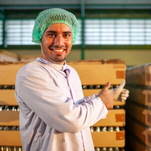 worker-presenting-products-on-the-production-line-2024-12-07-00-23-11-utc-min