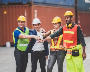 engineer foreman working in container terminal in term of industry logistic cargo shipping