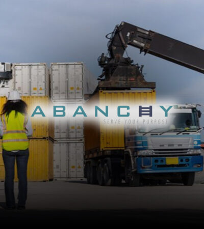 Glass teapot with warmer, with hot herbal tea on table on restau
